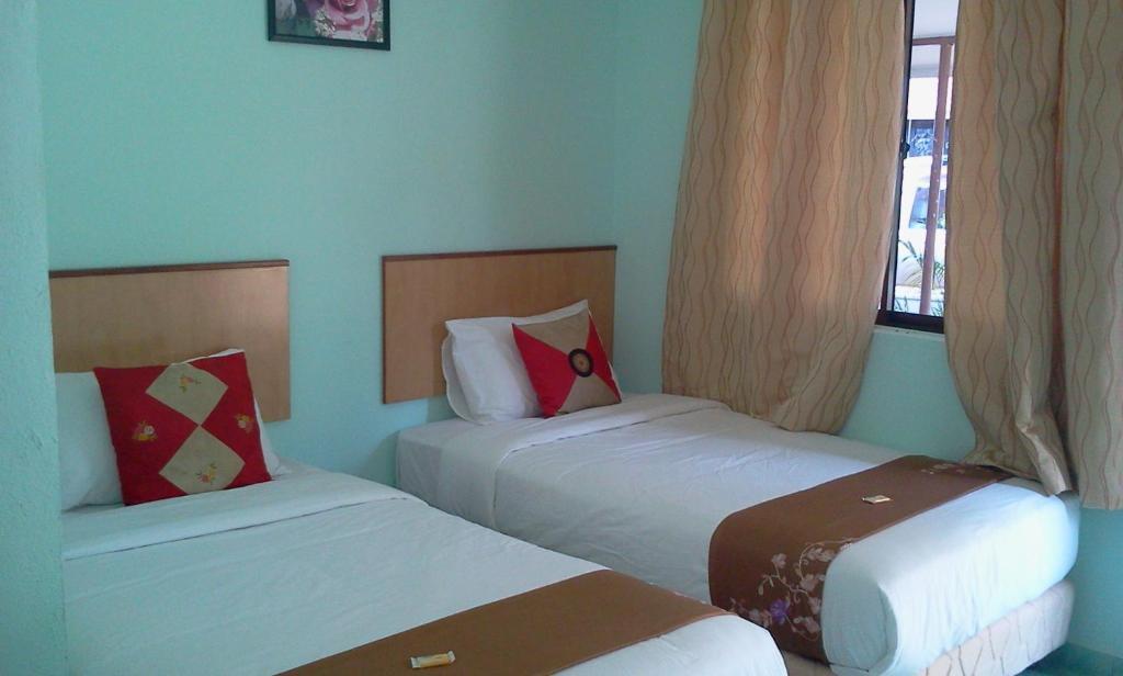 Rose Inn Motel Kuah Room photo