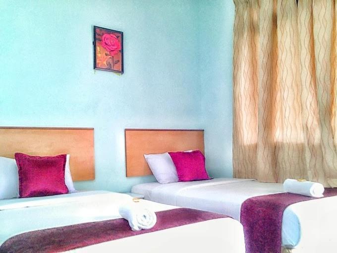 Rose Inn Motel Kuah Room photo