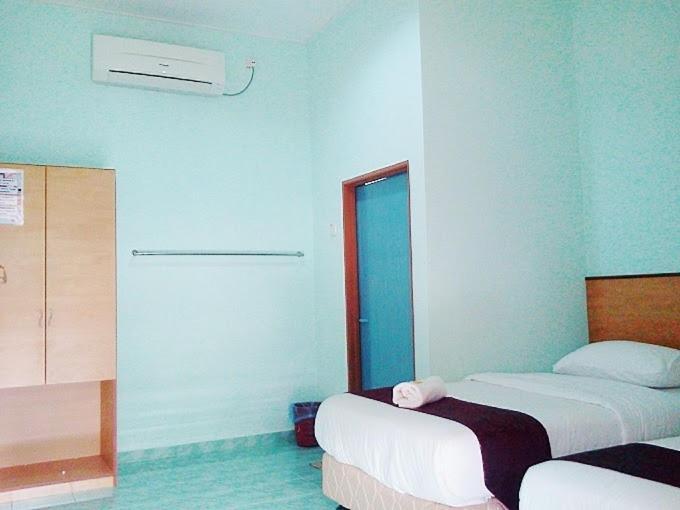 Rose Inn Motel Kuah Room photo